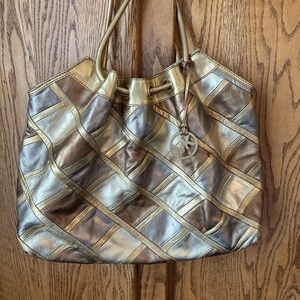 Michael Kors Gold and Silver Shoulder Bag with Modern Design